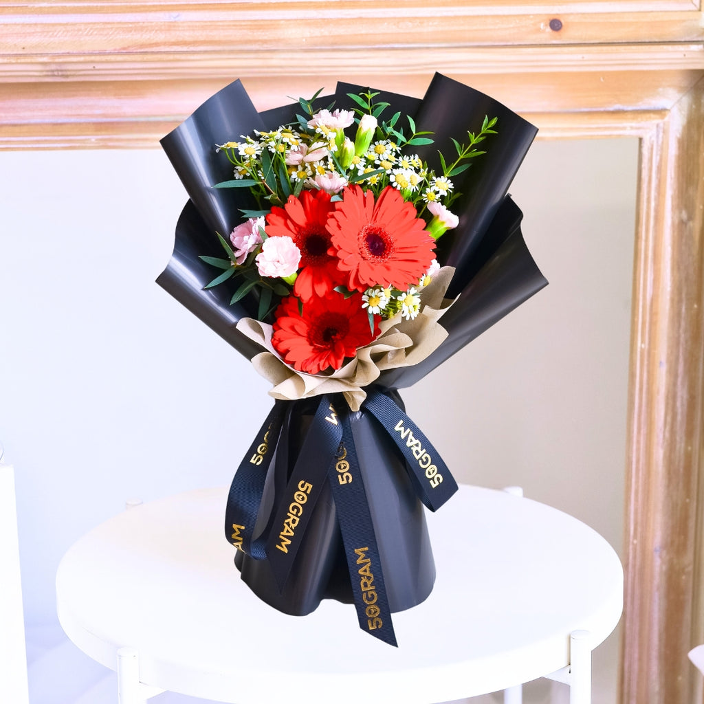 Red Wink Red Daisy Hand Bouquet image 3