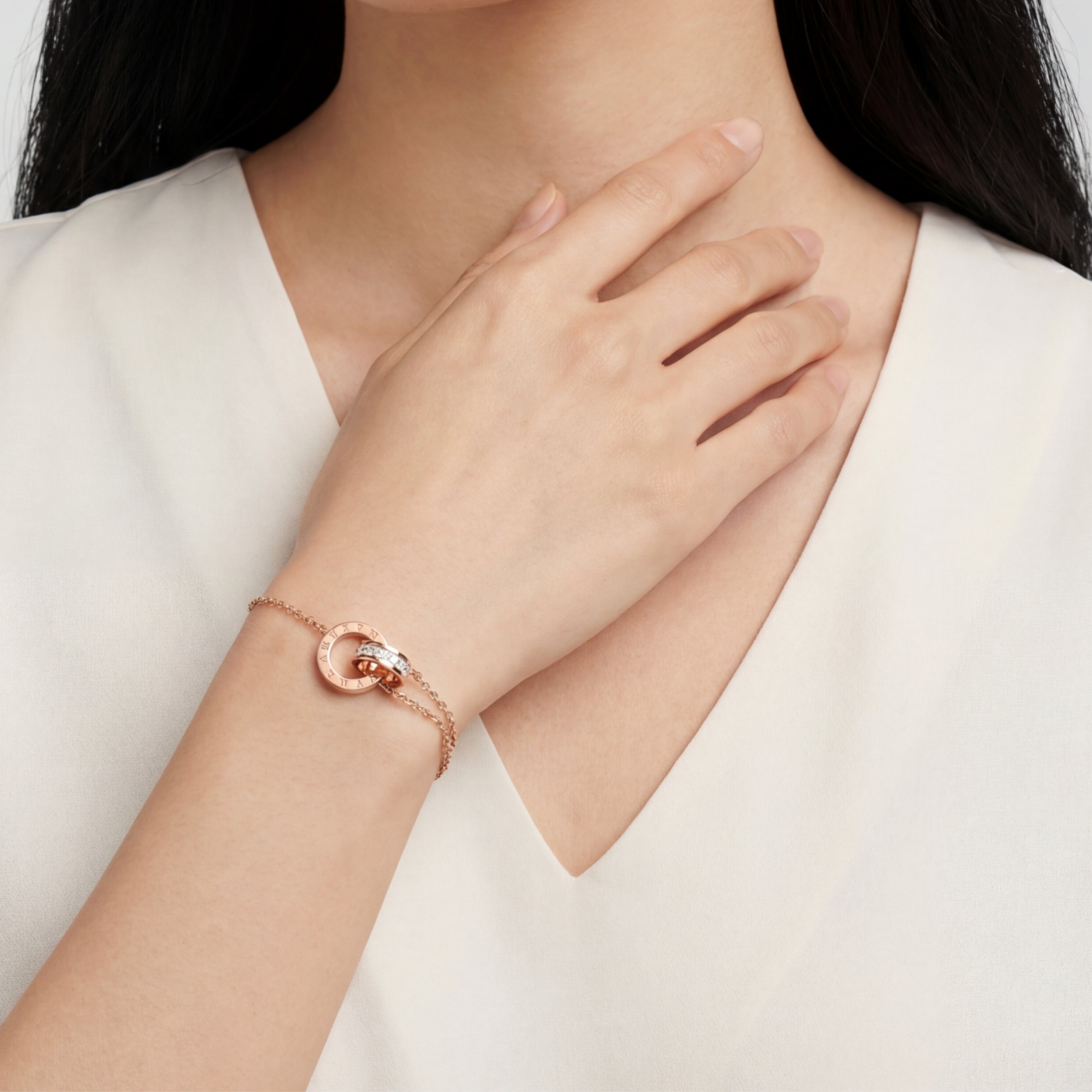 Athena Classic Interlocking Roman Numeral Bracelet in Rose Gold