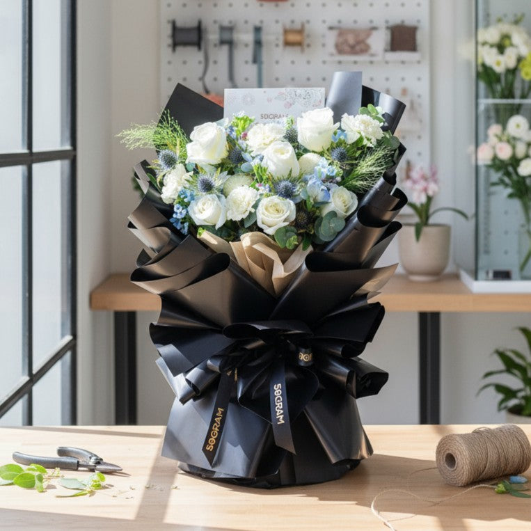 Frosted Elegance Light Blue Rose Hand Bouquet