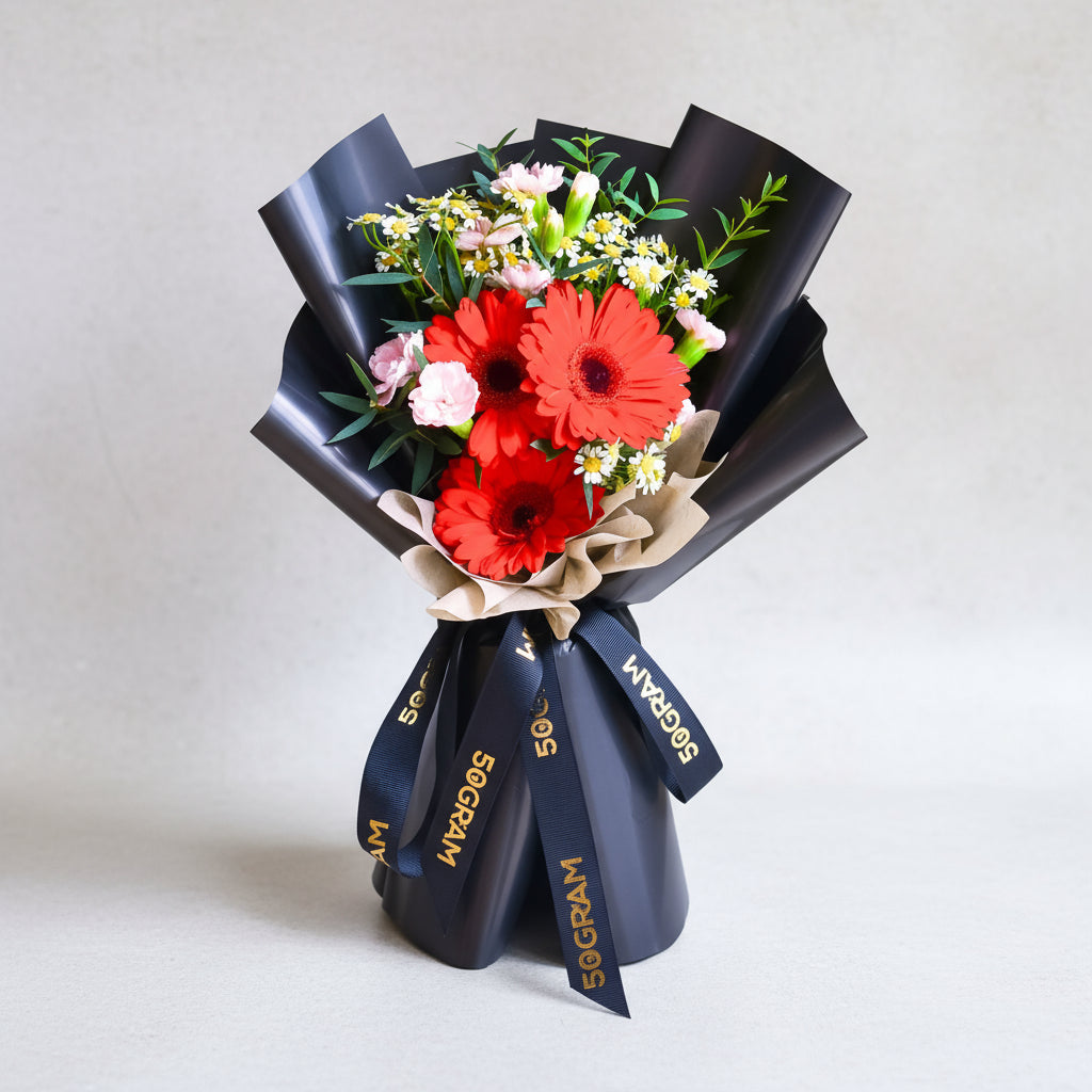 Red Wink Red Daisy Hand Bouquet image 0