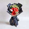 Red Wink Red Daisy Hand Bouquet image 0